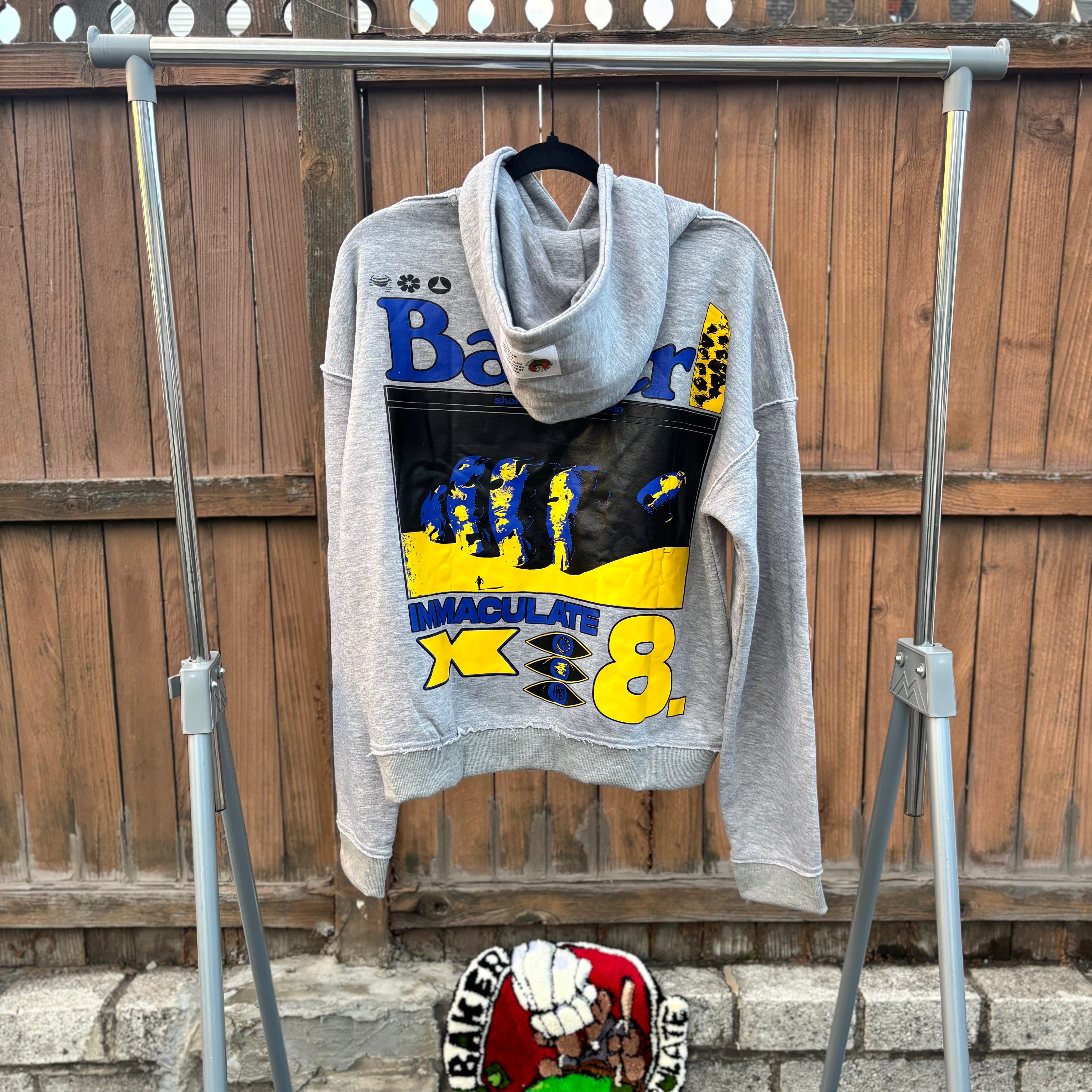 LITE GREY "BAKER IMMAC WORLDWIDE" HOODIE